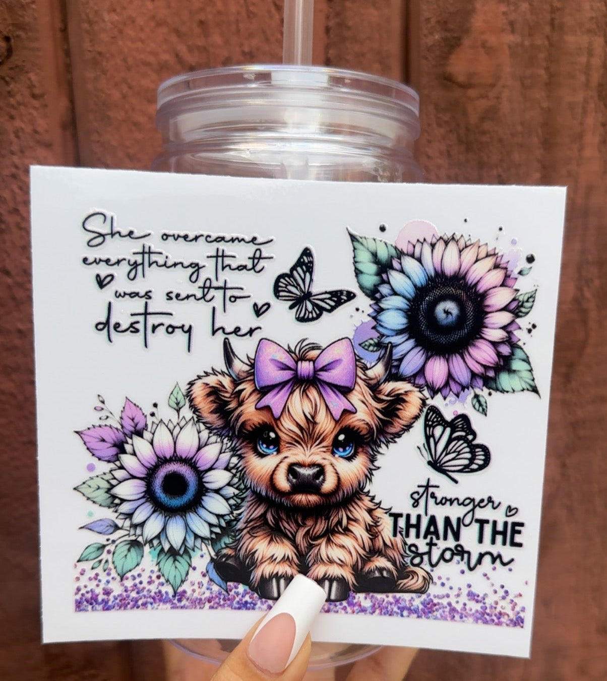 💜 16-24 oz. “Stronger Than the Storm” Cow Cup – Inspirational Highland Cow with Sunflowers, Butterflies & Purple Bow